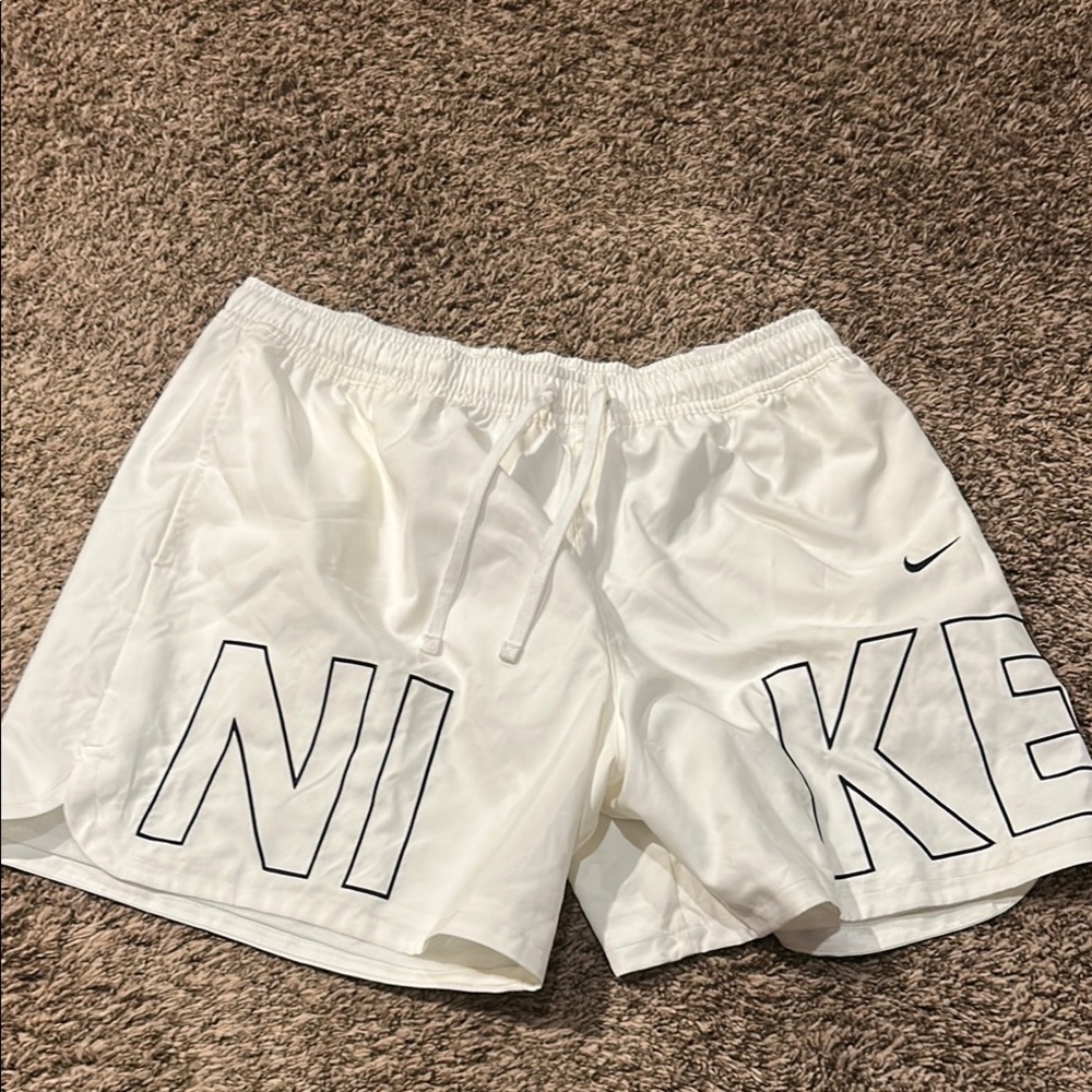 Nike White Sports Shorts with Black Lettering